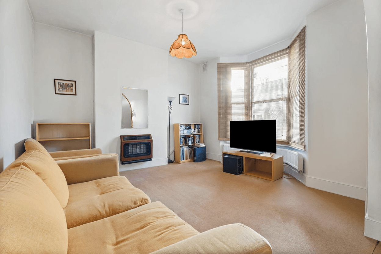 BEFORE: Neutral living room lacking style